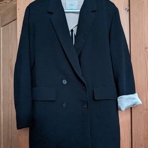 Large, navy blue Wilfred blazer